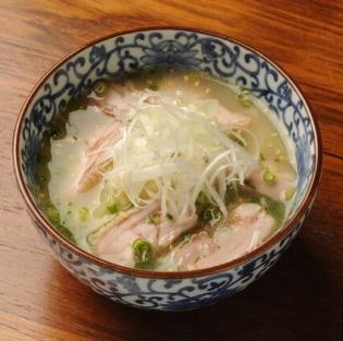 Chicken soup over rice