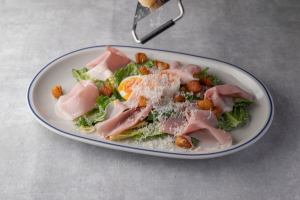 Caesar salad with Yumi pork pancetta and Kitasaka eggs