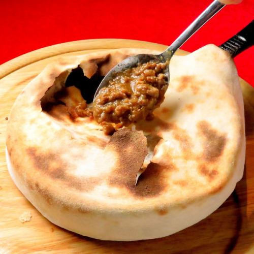 Meat pizza pie baked in a pot
