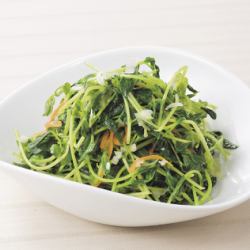 Stir-fried seasonal green vegetables