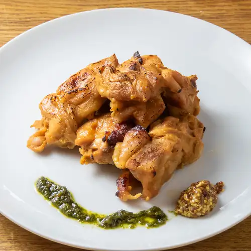 Tandoori-style oven-roasted chicken with yogurt and spice sauce