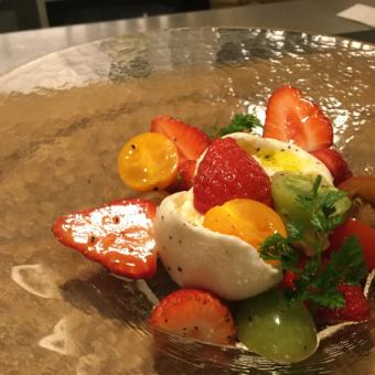 Burrata cheese, fruit and trevis salad