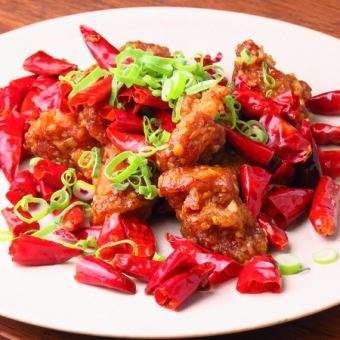 Super spicy! HOT chicken with a heap of chili peppers