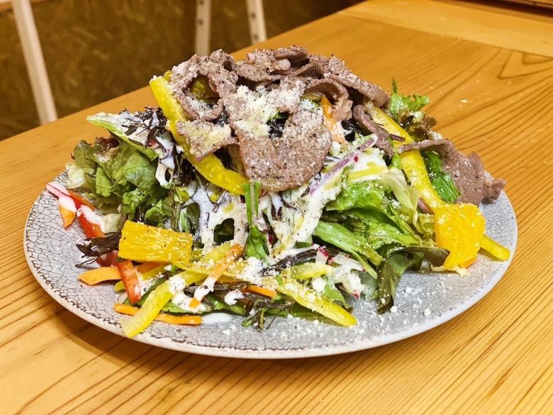 Beef tongue citrus Caesar salad