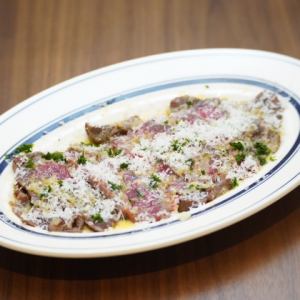 Grilled Wagyu beef carpaccio topped with cheese