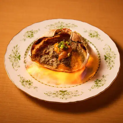 燃える蟹の甲羅焼き