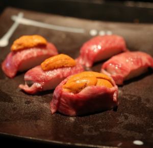 Two pieces of carefully selected sea urchin gunkan sushi shipped directly from Tsukiji