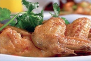 Deep fried chicken wings and nuoc mam