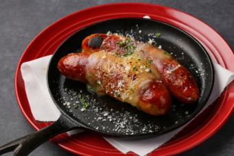 2 black pepper sausages topped with raclette cheese