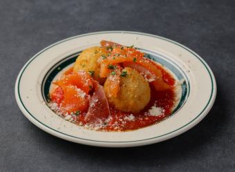 Porcini rice croquettes with prosciutto and salmon