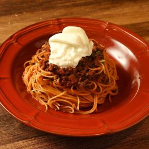 Bolognese topped with burrata cheese