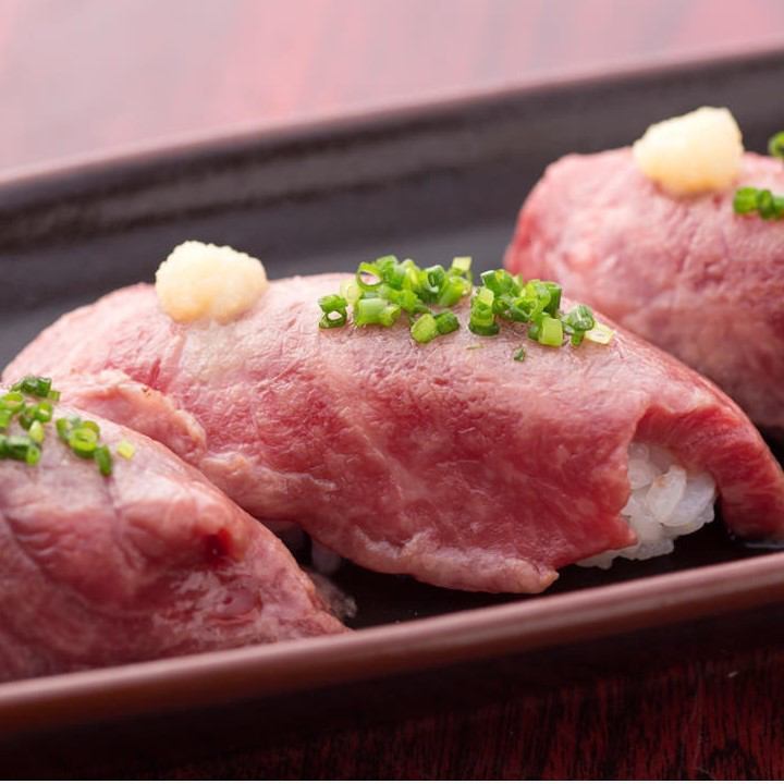A variety of local Okinawan dishes, including grilled Ishigaki beef nigiri!