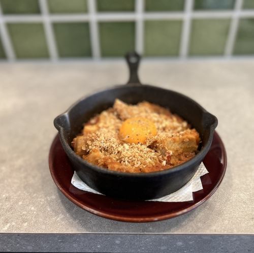 番茄醬燉牛肚，淋上蛋黃