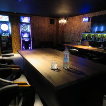 Table seats in front of the counter! Not to mention darts! Perfect for playing other games!