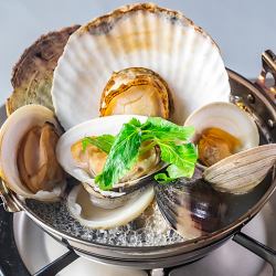 Steamed shellfish in sake