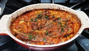 Lamb and white beans stewed in tomato sauce