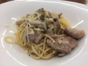Tomato cream pasta with duck and mushrooms