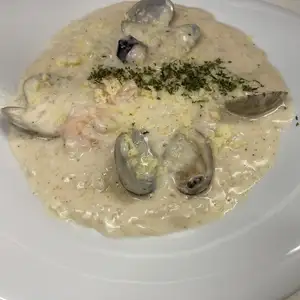 Seafood tomato or cream risotto