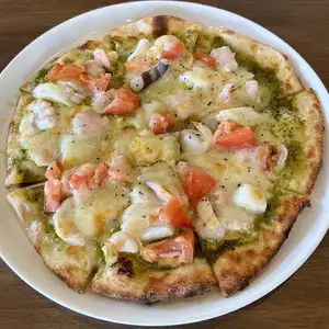 Genovese pizza with seafood and fresh tomatoes