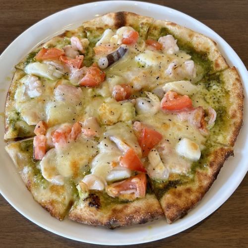Genovese pizza with seafood and fresh tomatoes