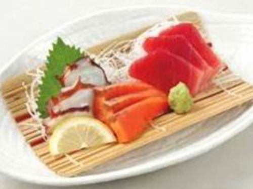 Three pieces of sashimi, two pieces