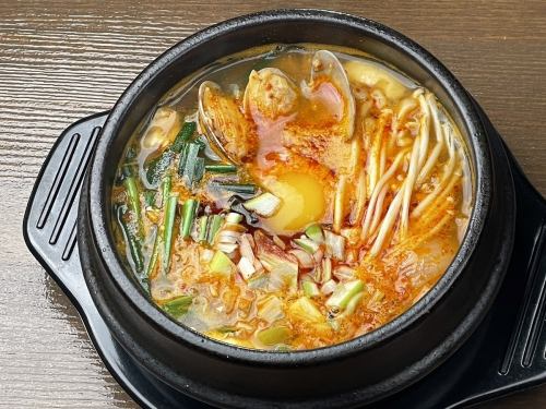 Boiling and dancing Soondubu jjigae