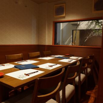 It is a private room seat for up to 8 people.Room with courtyard view.