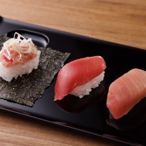 Three kinds of tuna (medium fatty tuna, lean tuna, and negitoro hand-rolled)