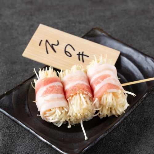 Charcoal-grilled fragrant enoki mushroom skewers
