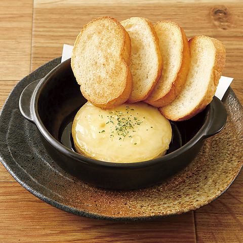 Camembert cheese baked in honey oven