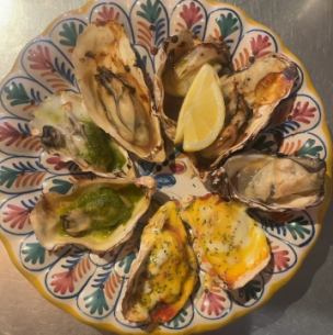 Assortment of 3 types of oysters in the shell