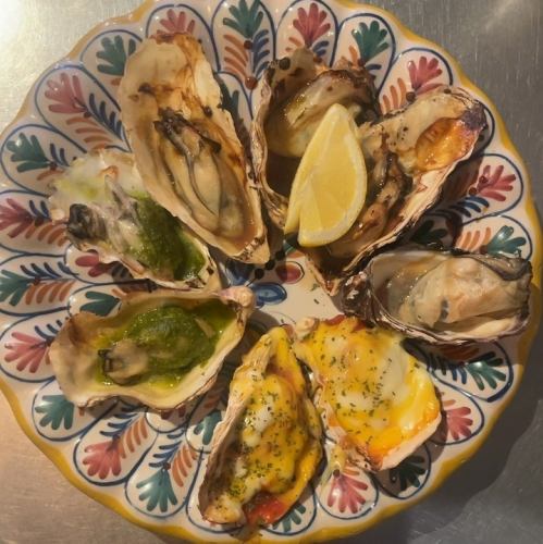 Assortment of 3 types of oysters in the shell