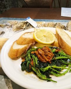 Sauteed oysters and kale with sea urchin butter