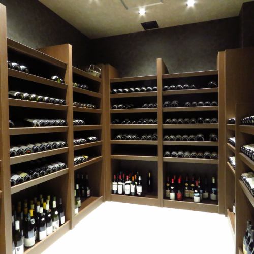 There are about 700 bottles of wine from around the world on hand.