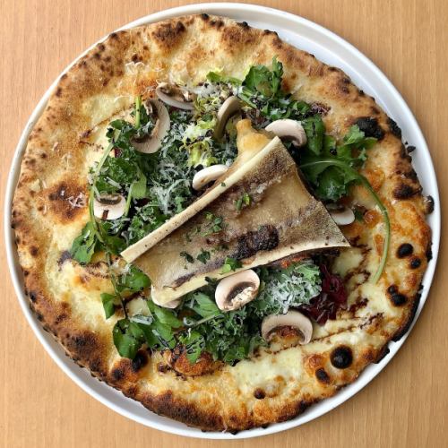 Green pizza with beef bones, kale and herbs
