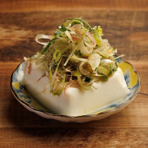 Cold tofu covered in condiments