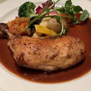 Confit chicken thigh on the bone (1 serving)