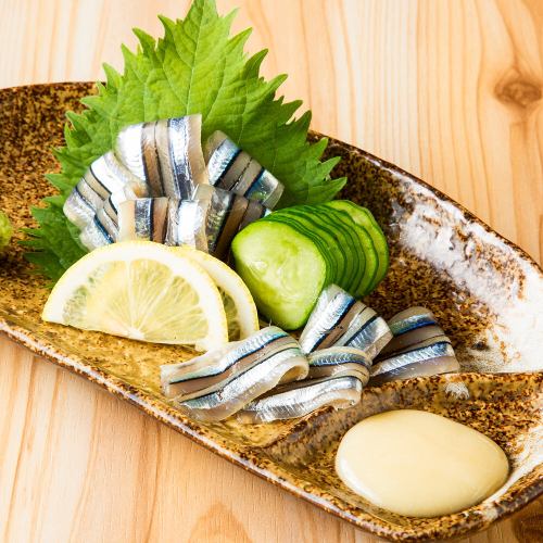 Silver-striped round herring sashimi