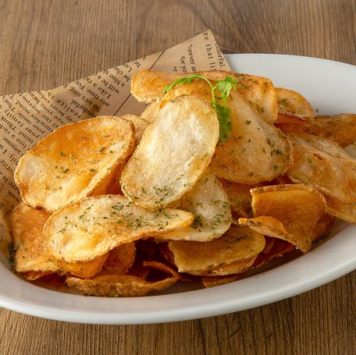 Freshly fried potato chips