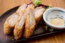 Deep fried meat wrapped in fresh ginger