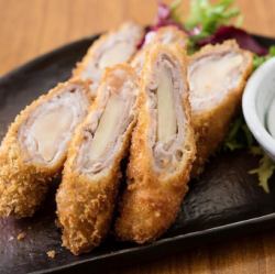 Deep fried meat wrapped in fresh ginger