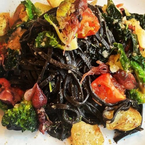 Hazawa spring vegetables and firefly squid peperoncino with black tagliolini infused with squid ink.