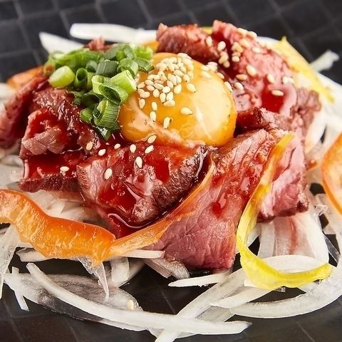 Grilled beef sashimi in yukhoe style