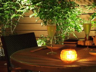 Outdoor terrace seating with a private room feel. Available for up to 6 people. For a date, 2 tables for 2 people each.