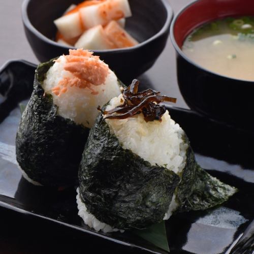 2 rice balls with miso soup and incense