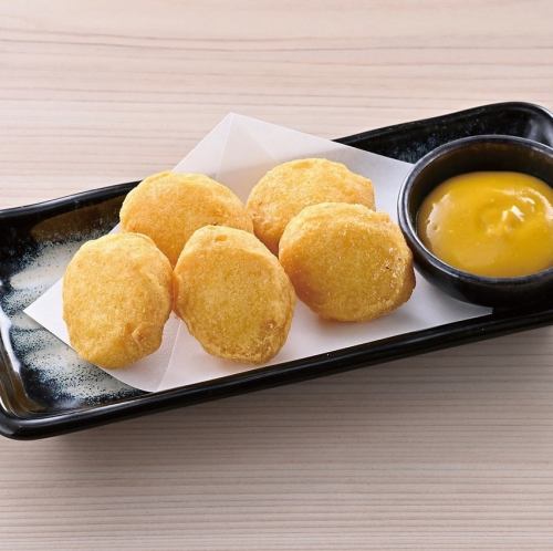 Shark nuggets with mustard sauce