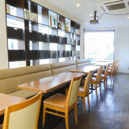 Table seats with a view of the Yokohama cityscape from the large windows.