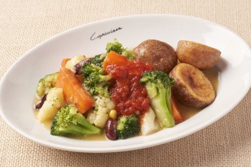 Steamed vegetables with butter and fried potatoes