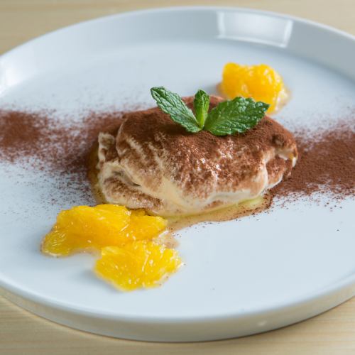 Tiramisu with seasonal fruit sauce