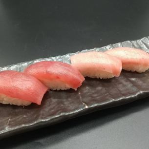 A sushi platter of premium bluefin tuna, medium fatty tuna and bigeye tuna